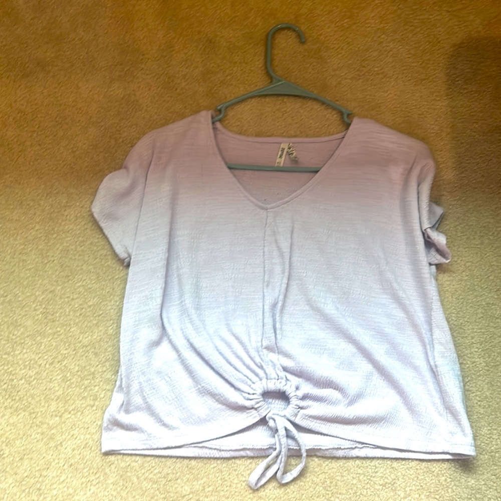 Light purple shirt, soft cloth. Good condition.